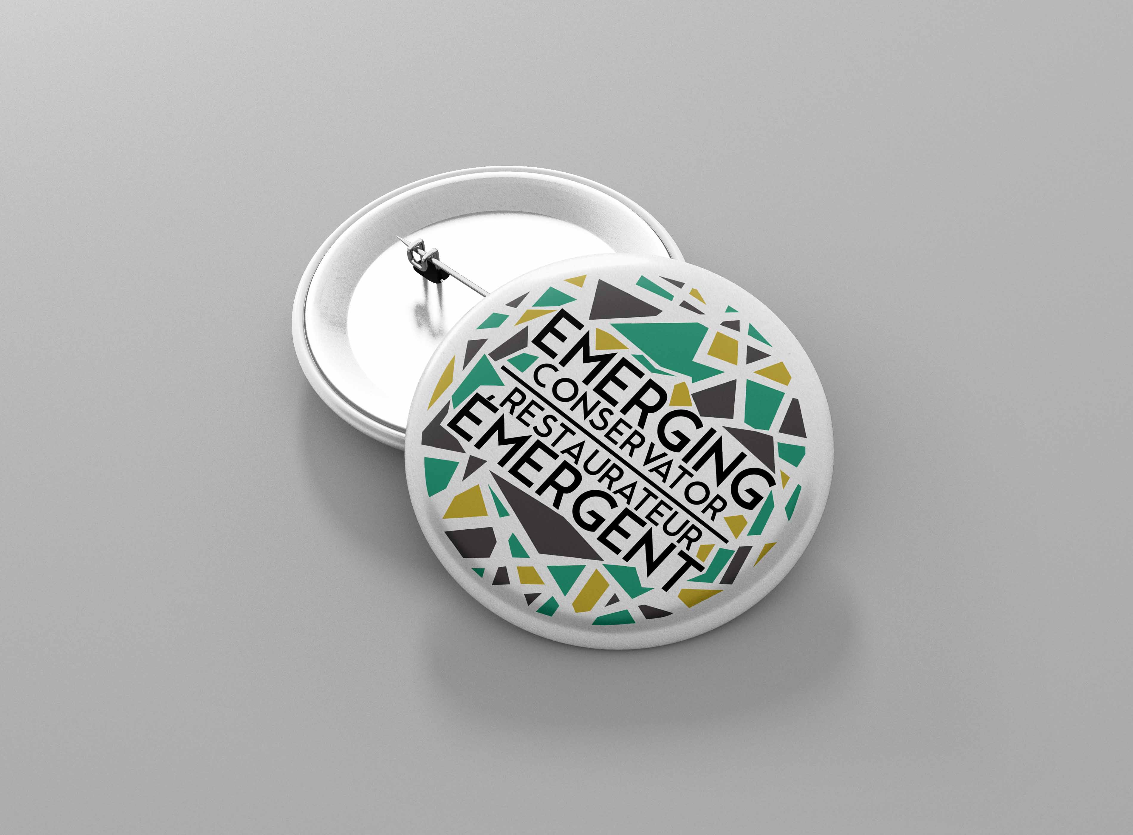 CAC08 Mock-up of a button pin on a grey background featuring the CAC-ACCR symbol — a circle made of gold, black, and teal mosaic with 'CAC-ACCR' in black sans serif font